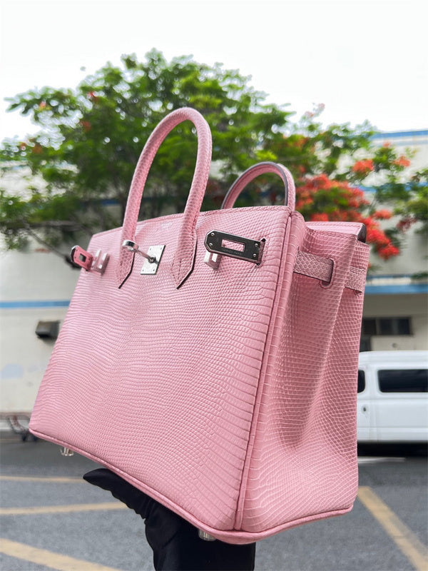Side view of considered structured handbag