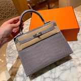 Side view of polished structured handbag