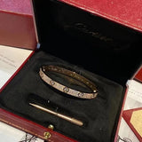 Close-up detail view of Cartier unisex jewelry piece