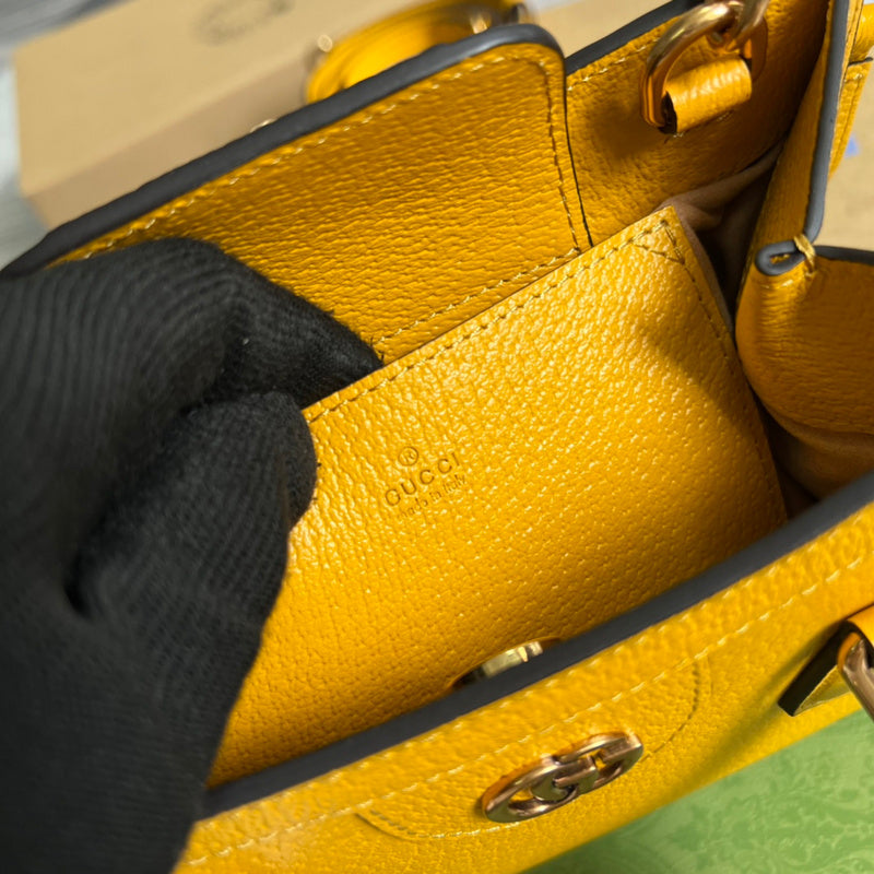 Side profile of statement signature women's handbag – women's luxury accessory
