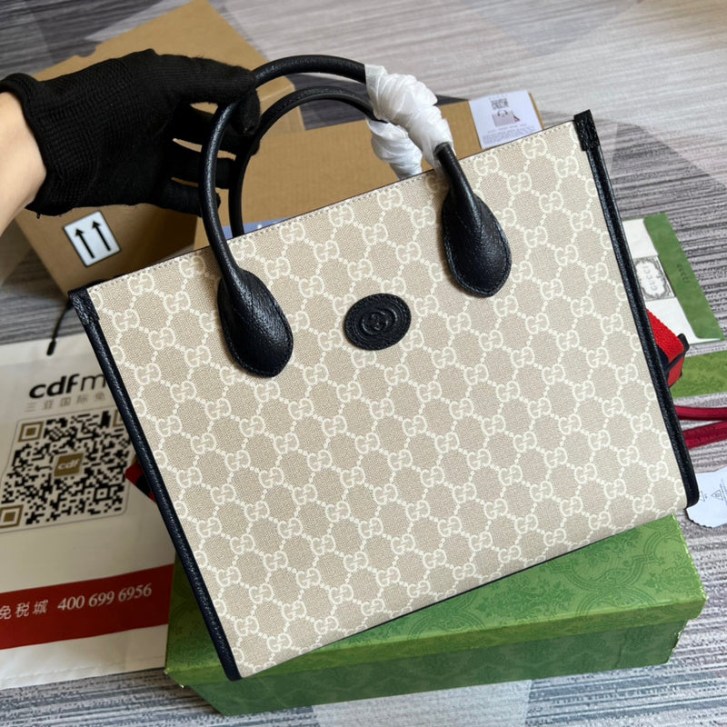 Handle and strap detail of everyday-luxe classic women's handbag – women's everyday handbag