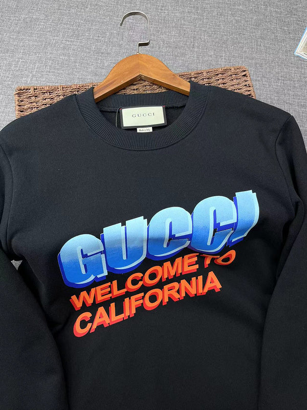 Full styled look of Gucci luxury clothing with signature branding