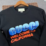 Full styled look of Gucci luxury clothing with signature branding