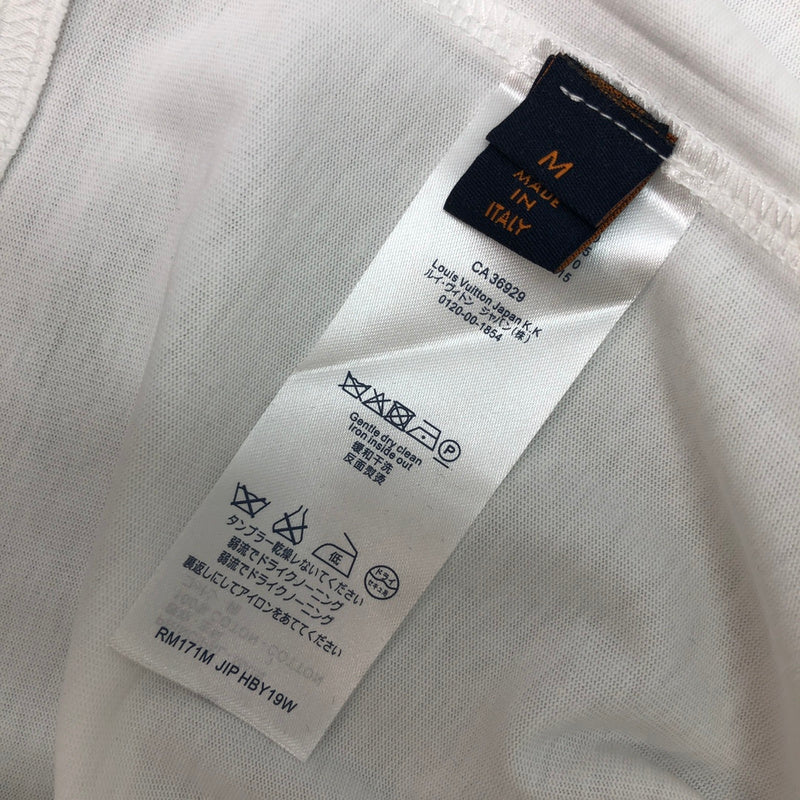 Flat lay presentation of Louis Vuitton cotton t-shirt with logo-detail design
