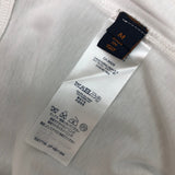Flat lay presentation of Louis Vuitton cotton t-shirt with logo-detail design