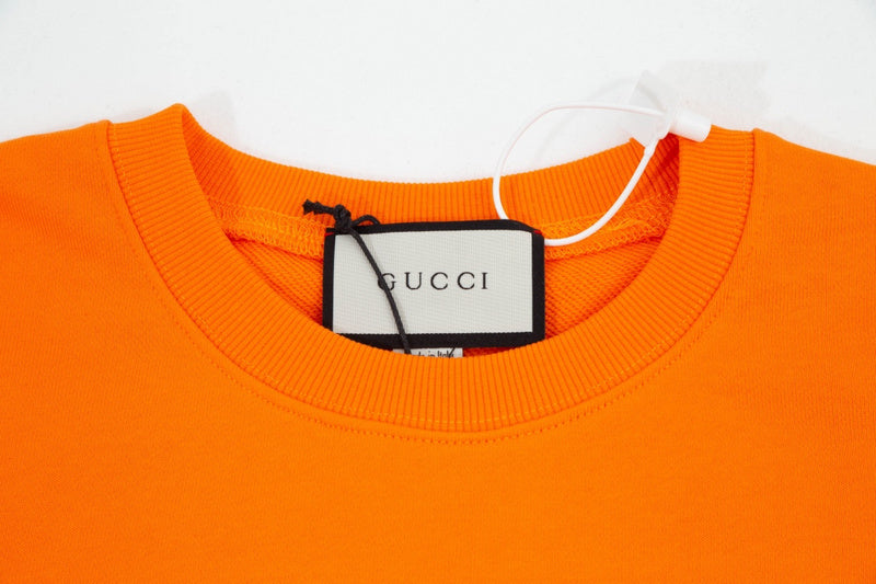 Close-up detail shot of Gucci luxury clothing with everyday silhouette