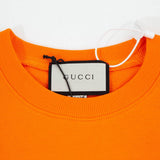 Close-up detail shot of Gucci luxury clothing with everyday silhouette