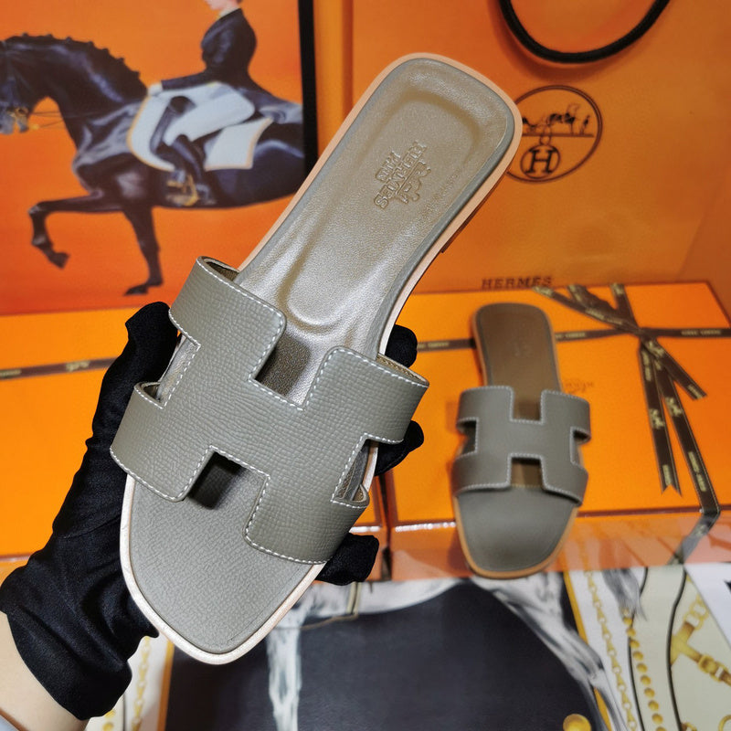 Hermès Camel Flat Thong Sandals - Side Profile View