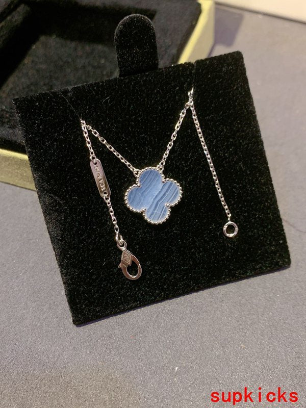 Lifestyle view of Van Cleef & Arpels unisex jewelry piece
