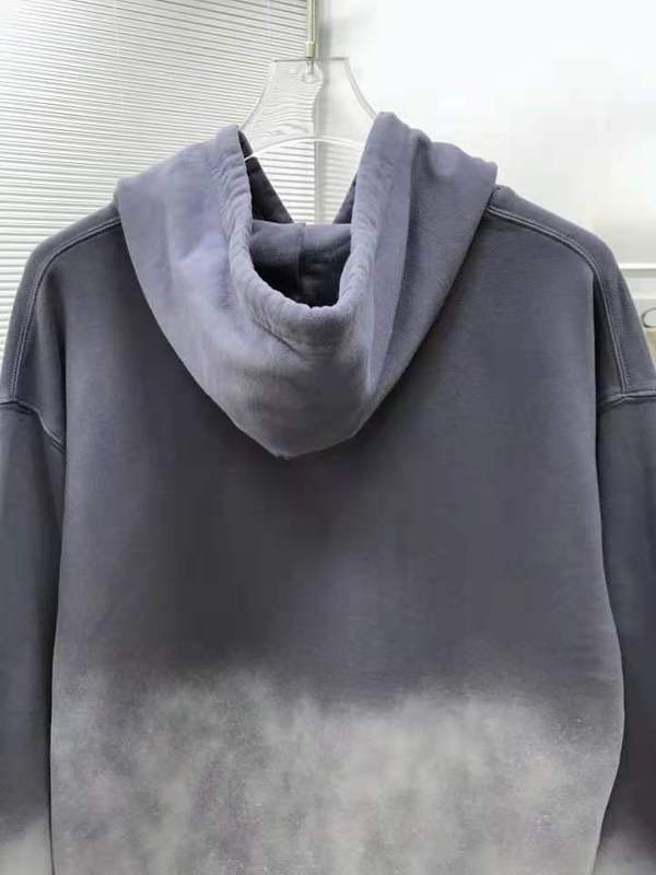 Close-up detail shot of Louis Vuitton luxury clothing with relaxed-fit cut