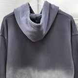 Close-up detail shot of Louis Vuitton luxury clothing with relaxed-fit cut