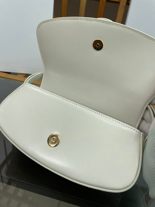 Front view of sleek statement women's handbag – women's luxury handbag