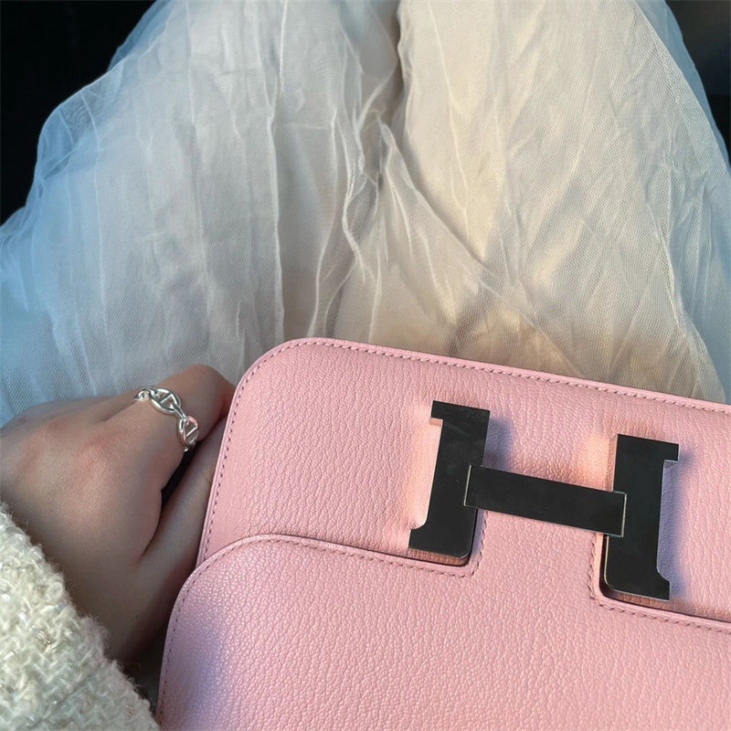 Side view of considered structured handbag