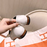 Hermès Grey Bow-Detail Flats - Studio Shot