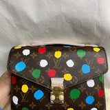 Front view of elevated signature women's handbag – women's luxury handbag