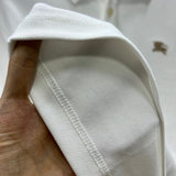 Close-up of Burberry designer clothing craftsmanship