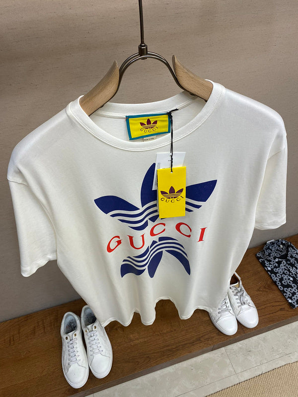 Front view of Gucci luxury clothing with signature branding