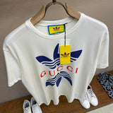 Front view of Gucci luxury clothing with signature branding