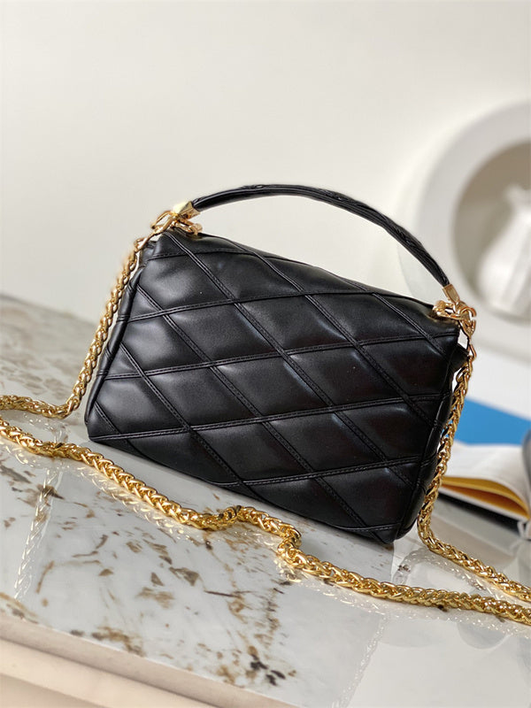  contemporary handbag styled with outfit