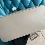 Styled lifestyle shot of modern signature women's handbag – women's designer-style accessory