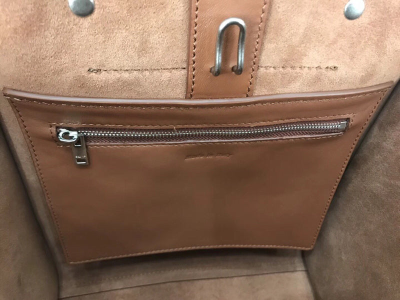 Styled lifestyle shot of modern signature women's handbag – women's designer-style accessory