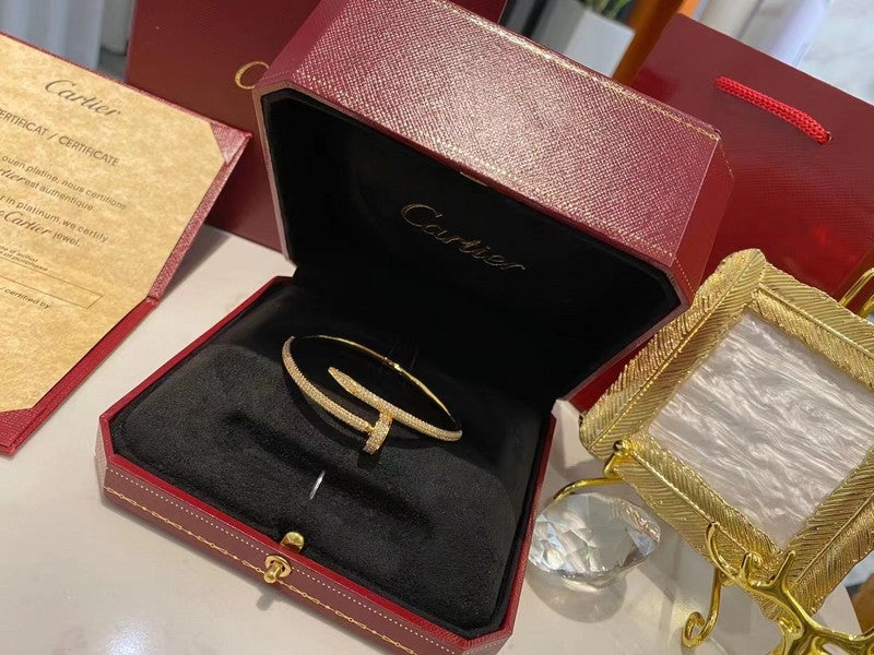 Close-up detail view of Cartier unisex jewelry piece