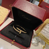 Close-up detail view of Cartier unisex jewelry piece