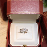 Side view of Cartier unisex jewelry piece