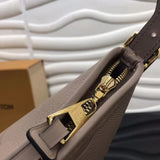 Handle and strap detail of classic premium women's handbag – women's premium purse
