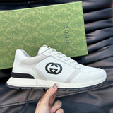 Gucci Designer sneakers in muted earth tones heritage-inspired look front view
