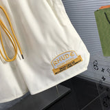 Front view of Rhude luxury clothing with streetwear-inspired cut