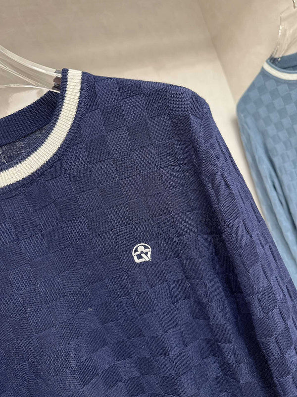 Full styled look of Louis Vuitton luxury clothing with signature branding