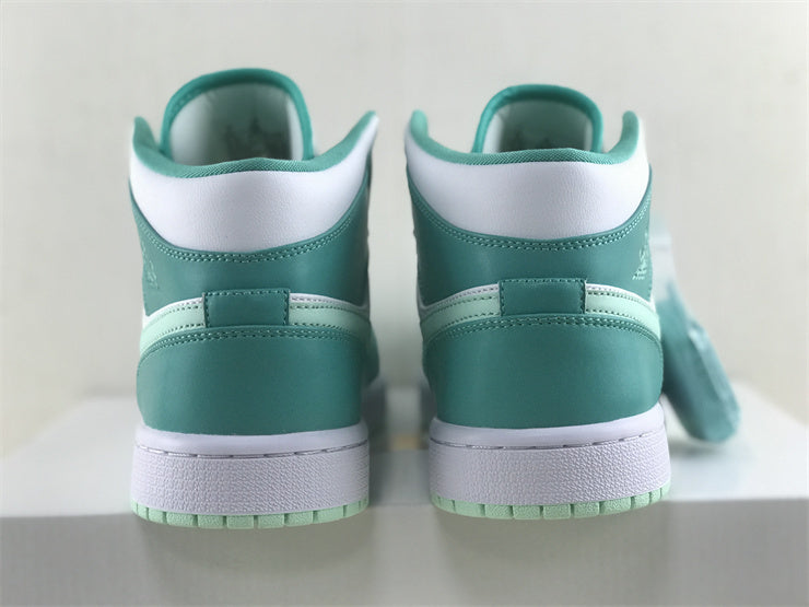 Side profile of Nike soft grey sneakers padded collar comfort