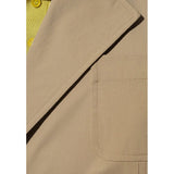 Close-up of Bottega Veneta jackets hardware and fine stitching