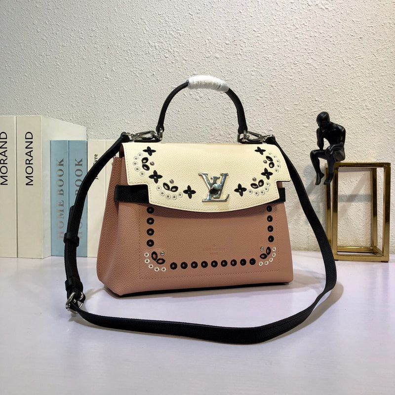 Side profile of structured signature women's handbag – women's statement bag