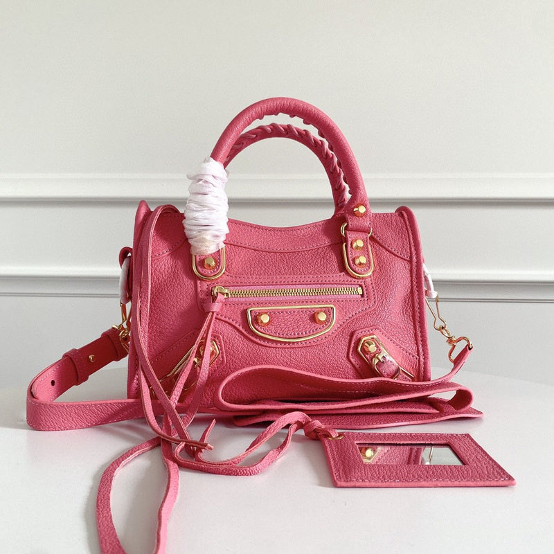 Zivas Charm Streamlined Design Statement Handbag (Signature Shape & Finish) – Lifestyle Shot