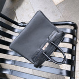 Side view of considered structured handbag