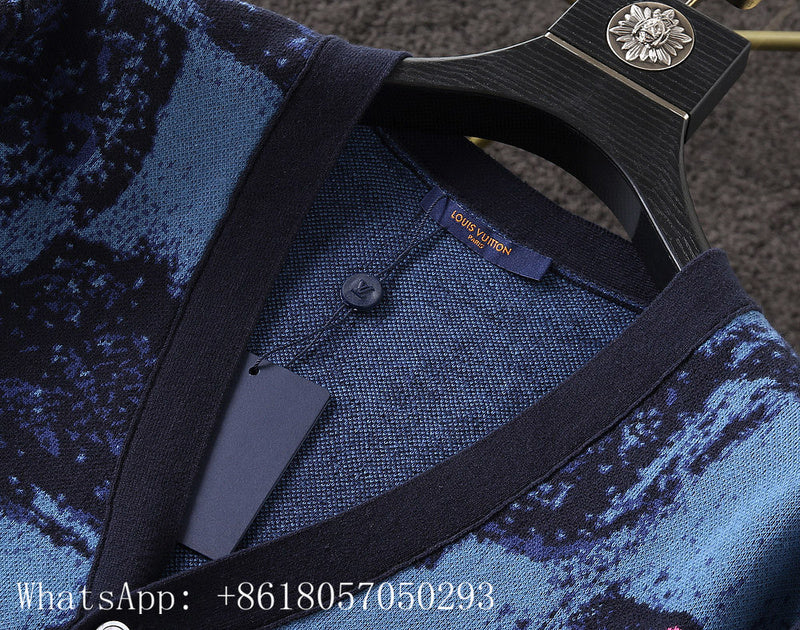 Flat lay presentation of Louis Vuitton luxury clothing with runway-inspired design