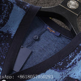 Flat lay presentation of Louis Vuitton luxury clothing with runway-inspired design