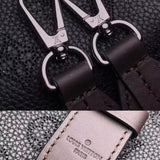 Handle and strap detail of polished sleek women's handbag – women's luxury accessory