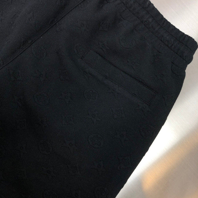 Back view of Louis Vuitton luxury clothing with signature branding