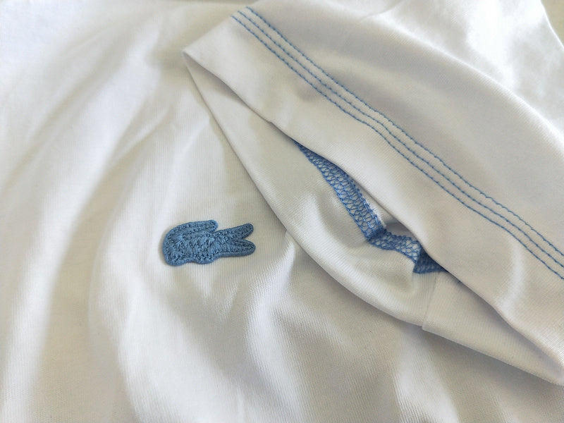 Side profile of Lacoste luxury clothing with tailored silhouette