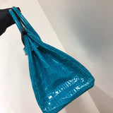 Close-up detail of understated bag design