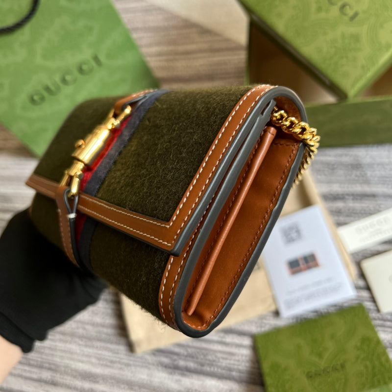 Styled lifestyle shot of signature polished women's handbag – women's everyday handbag