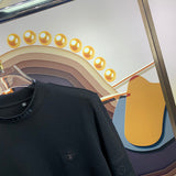 Full styled look of Louis Vuitton luxury clothing with monogram-inspired silhouette
