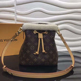 Front view of modern signature women's handbag – women's luxury accessory