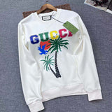 Close-up detail shot of Gucci luxury clothing with signature branding