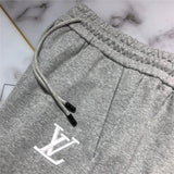 Close-up detail shot of Louis Vuitton cotton t-shirt with label-forward styling