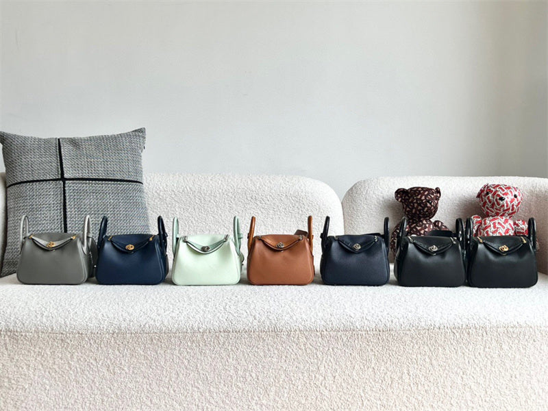  Contemporary shoulder bag carried on shoulder 16