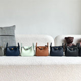  Contemporary shoulder bag carried on shoulder 16